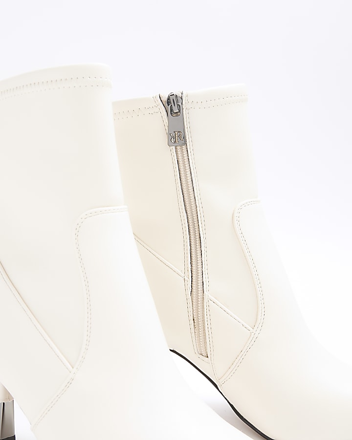 Cream toe cap heeled ankle boots