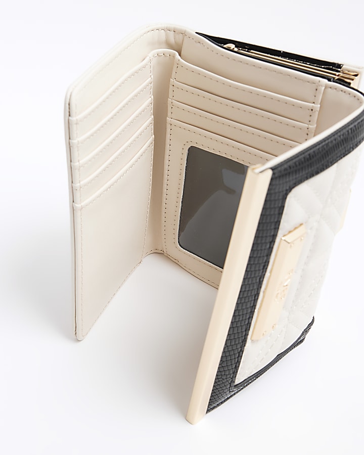 Cream quilted clip top purse