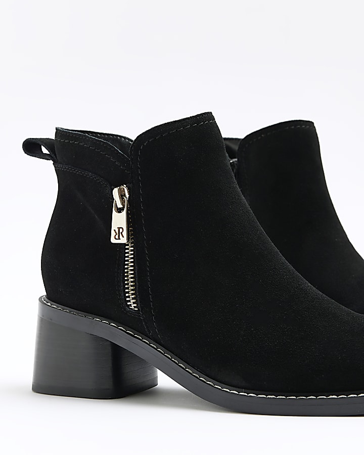 Black suede heeled ankle boots