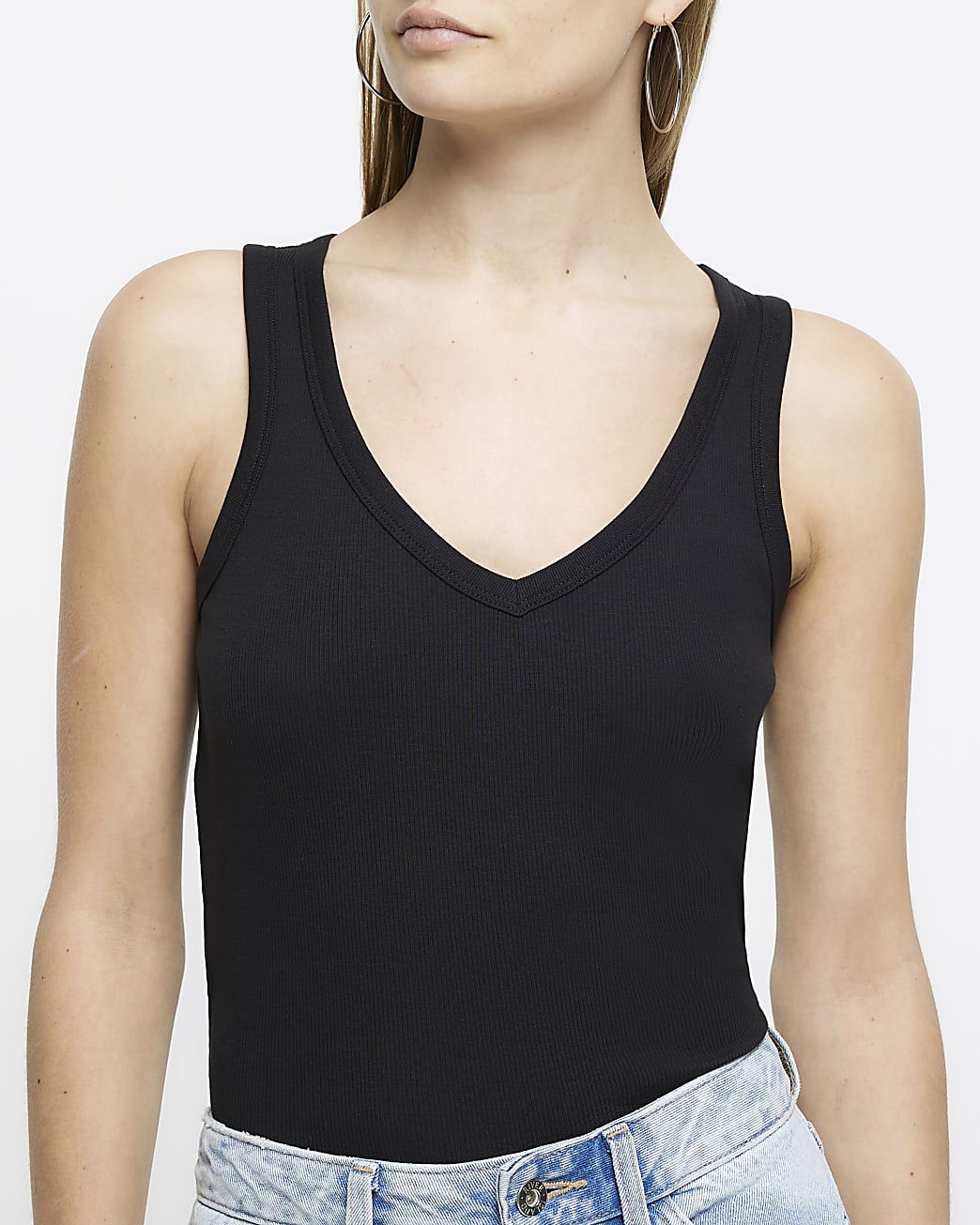 Black v-neck fitted vest