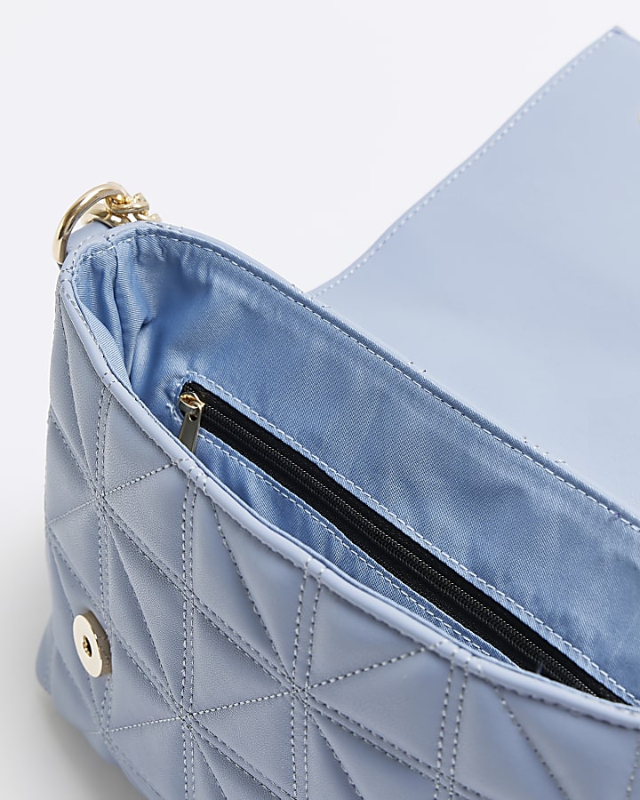 Blue quilted cross body bag