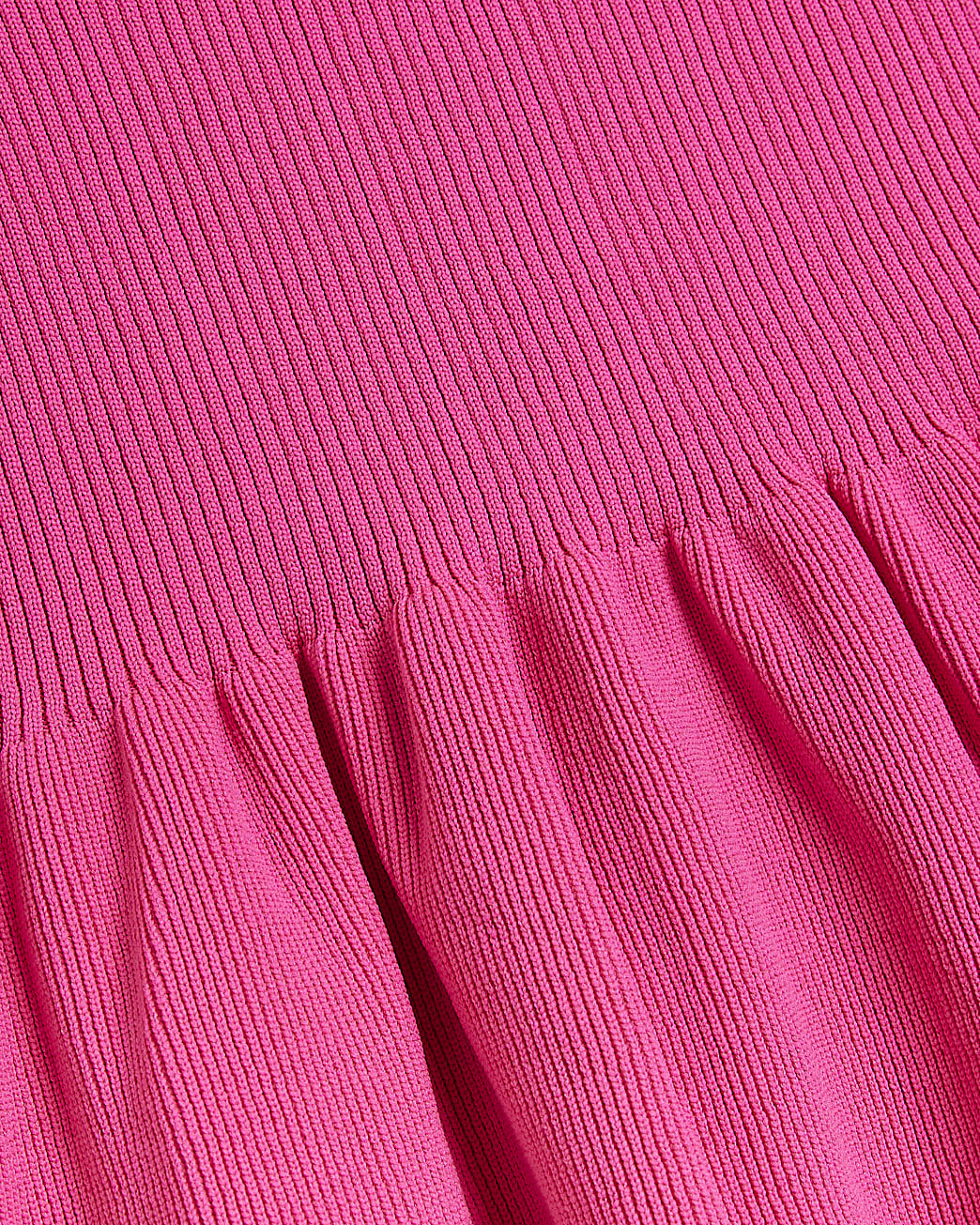 Pink knit peplum jumper