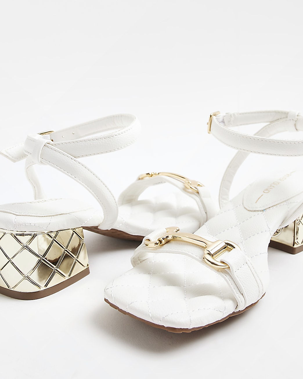 White quilted heeled block sandals