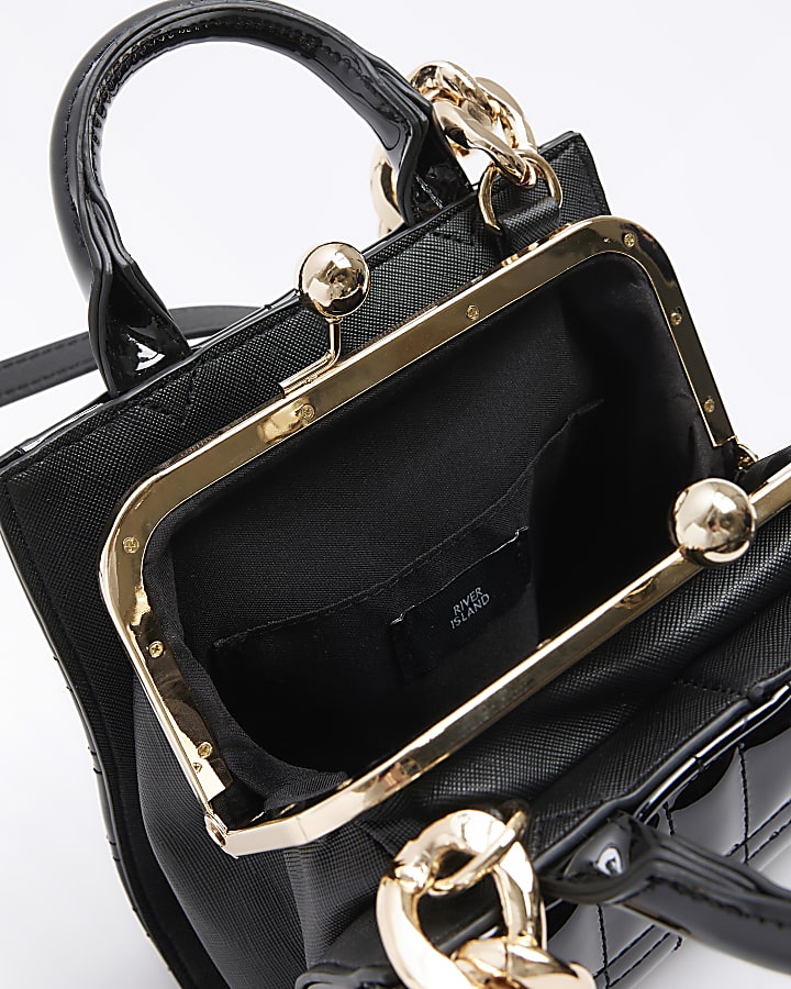 Black patent clip top cross body bag