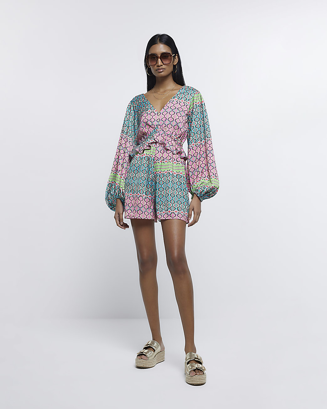 Pink geometric long sleeve playsuit