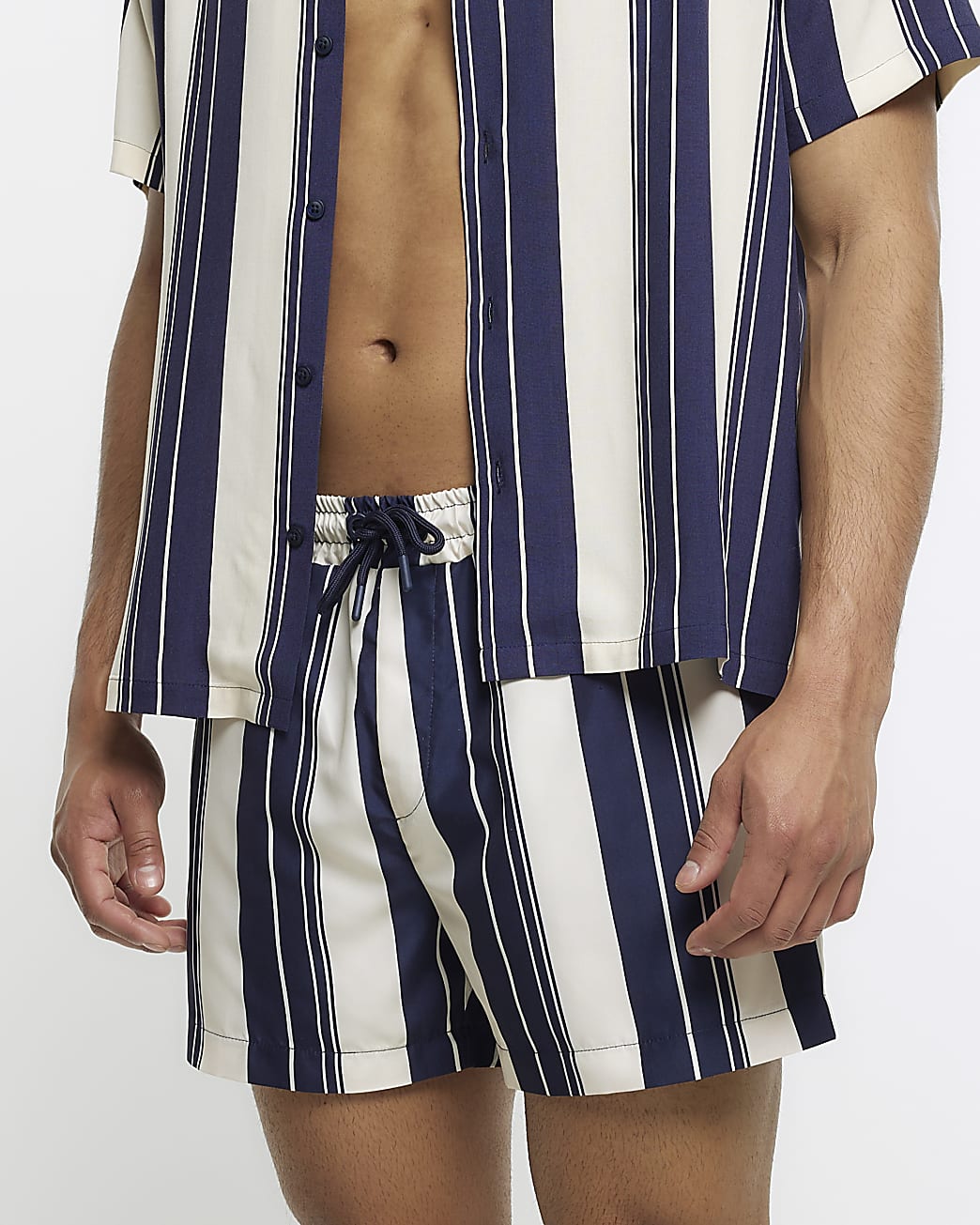 Navy regular fit striped swim shorts