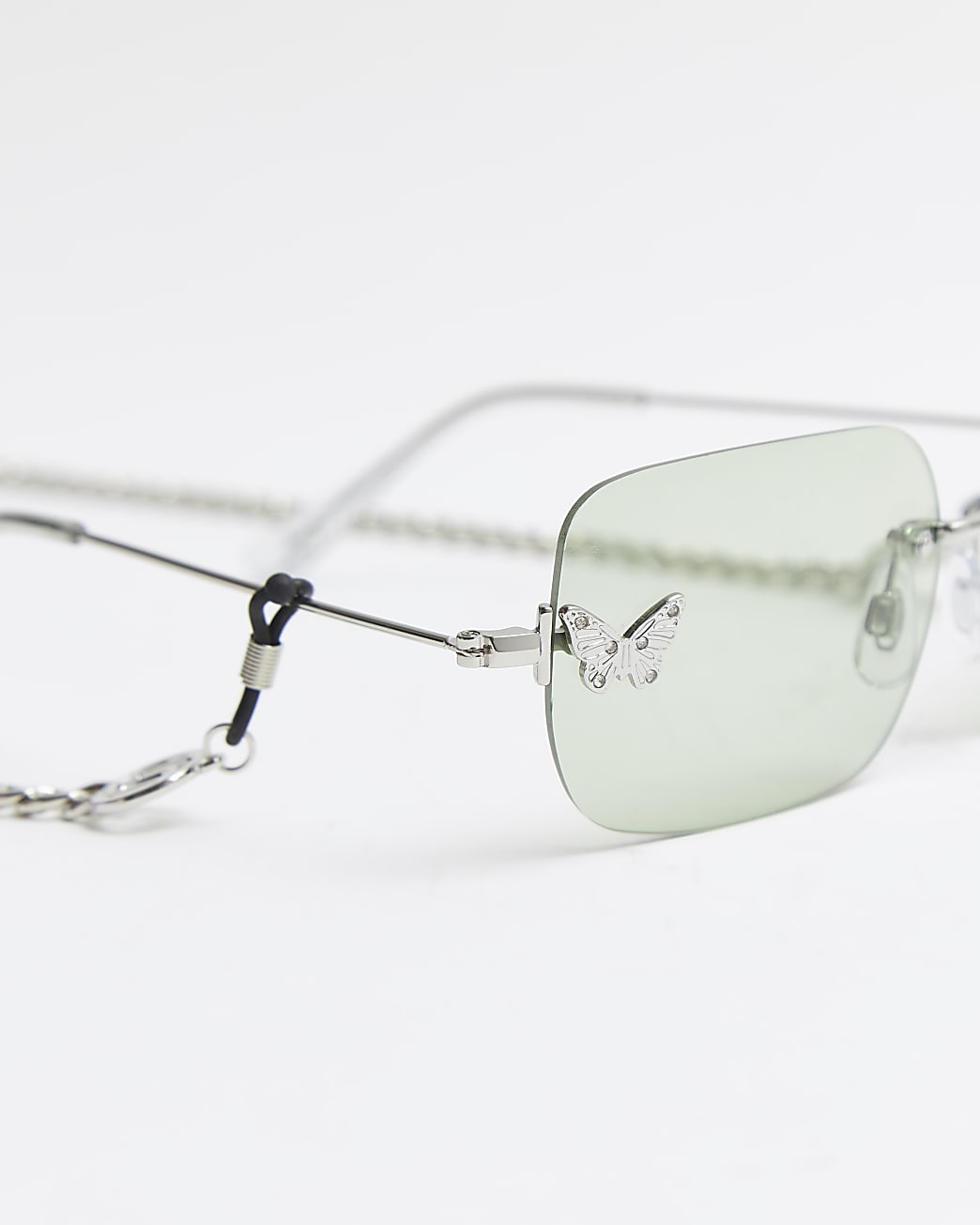Green rimless rectangular frame sunglasses