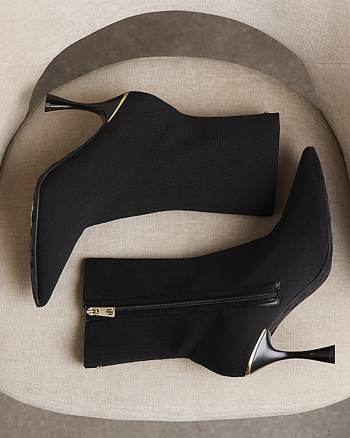 Black knitted heeled ankle boots