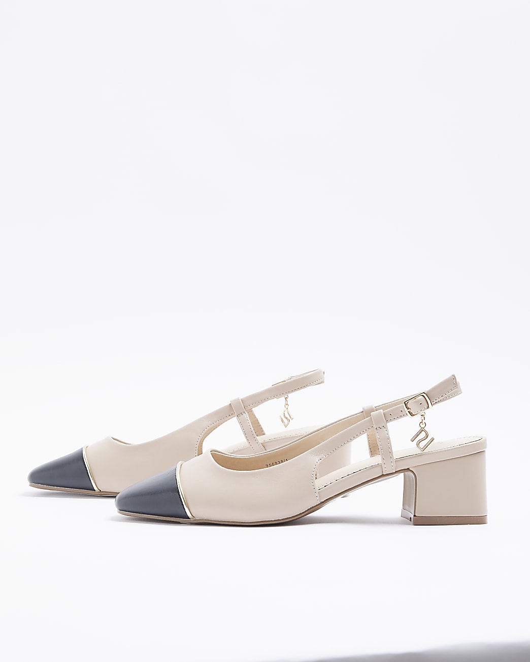 Beige heeled slingback shoes