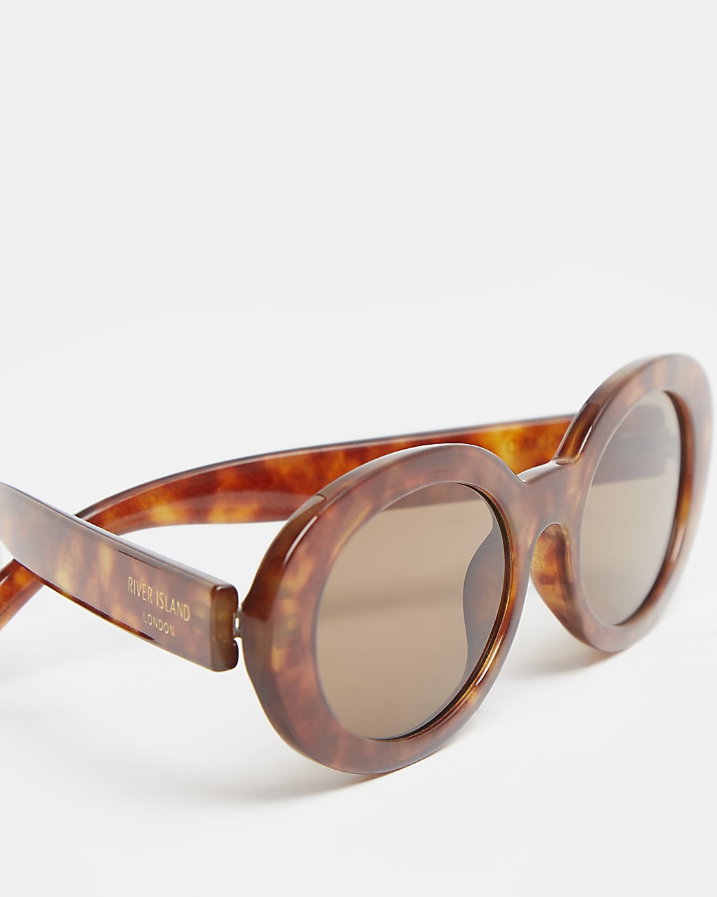 Brown oval slim sunglasses