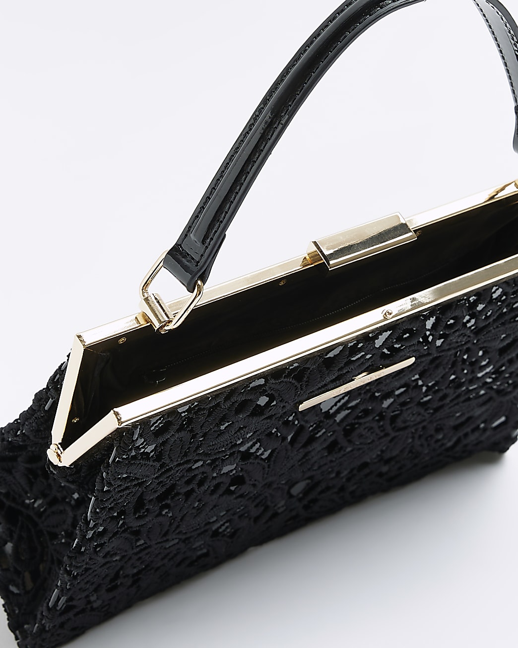 Black lace frame shoulder bag