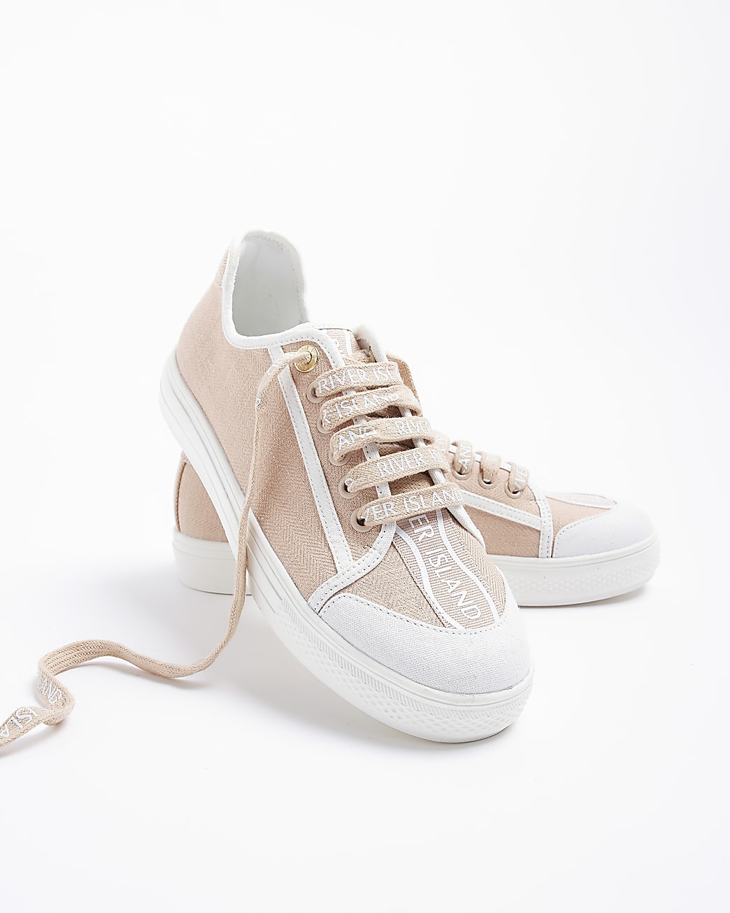 Pink canvas plimsoll trainers