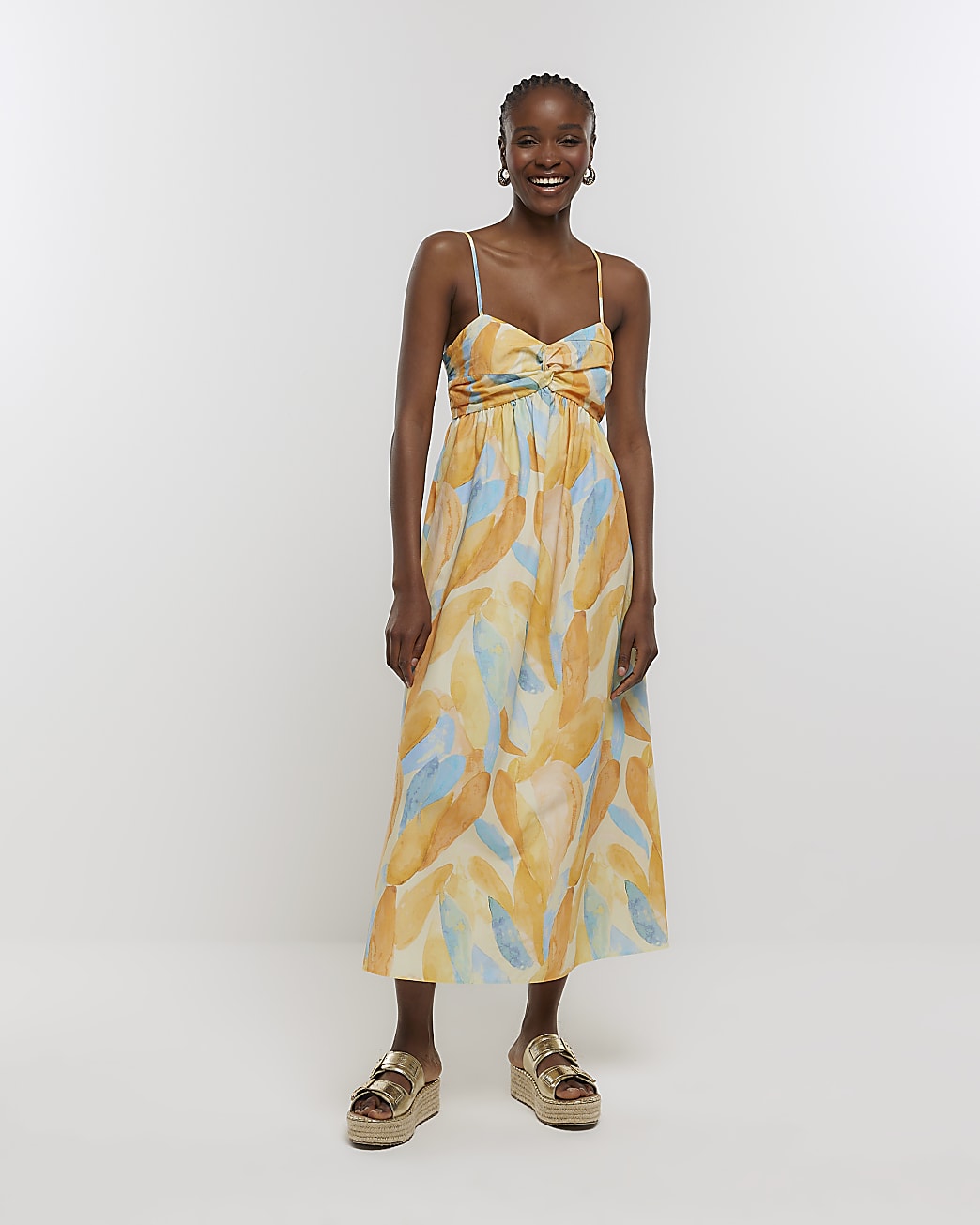 Orange print sleeveless midi dress