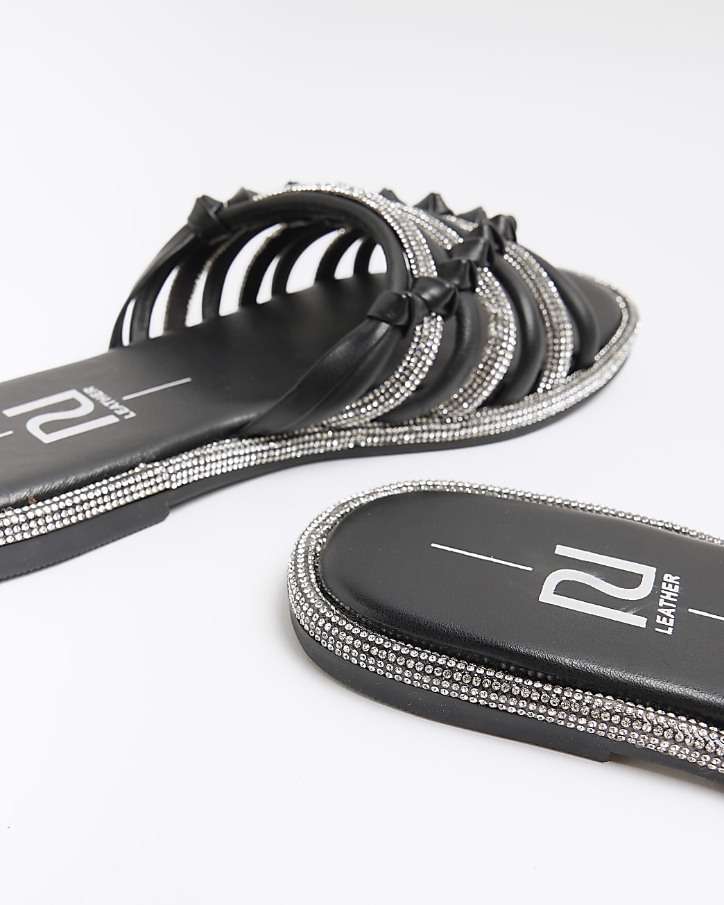Black embellished slides