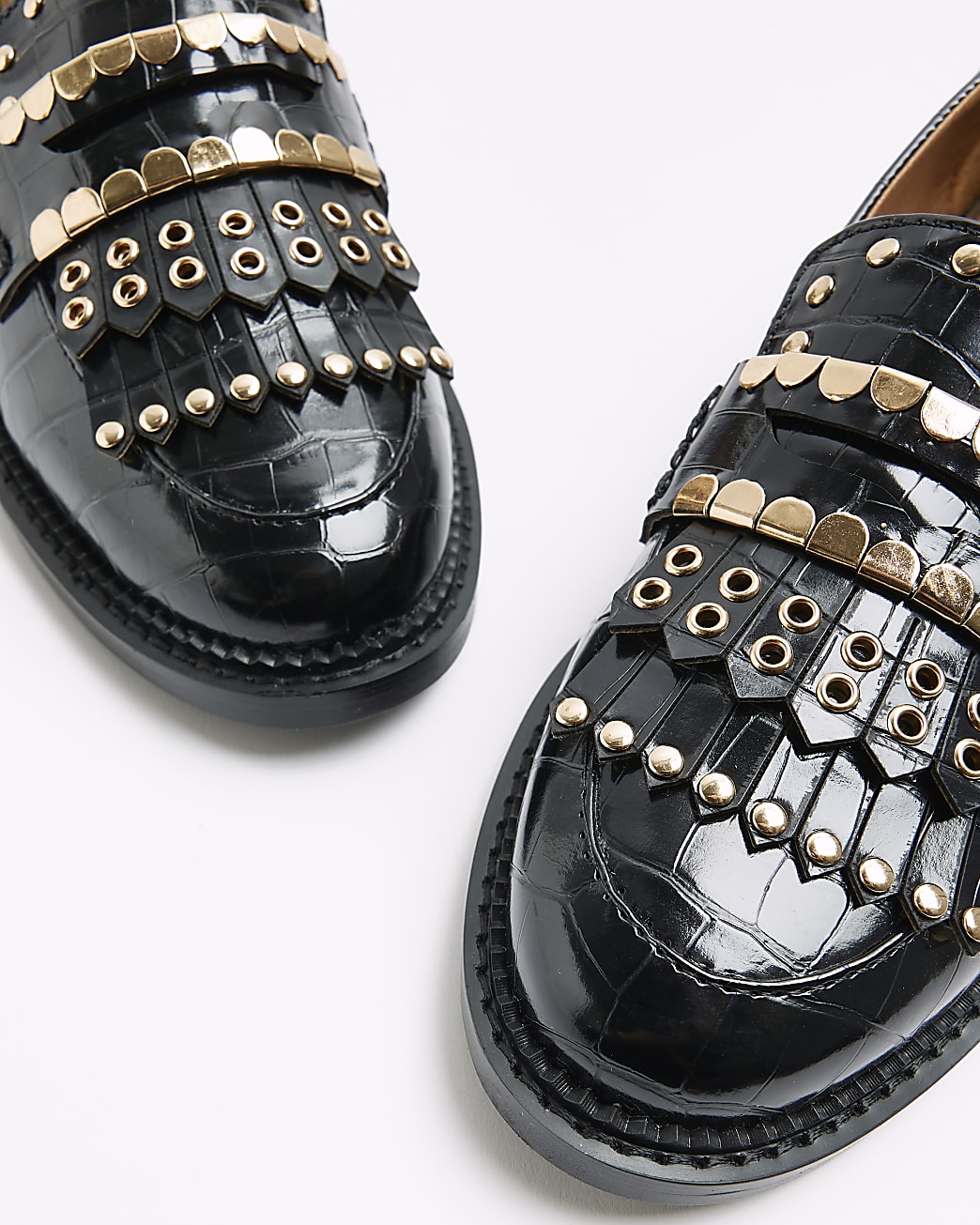 Black studded fringe loafers