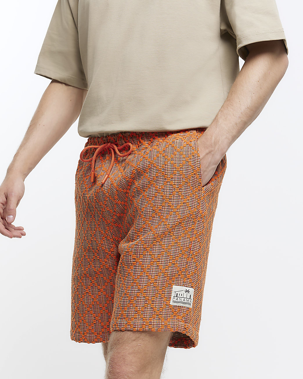 Orange regular fit textured shorts