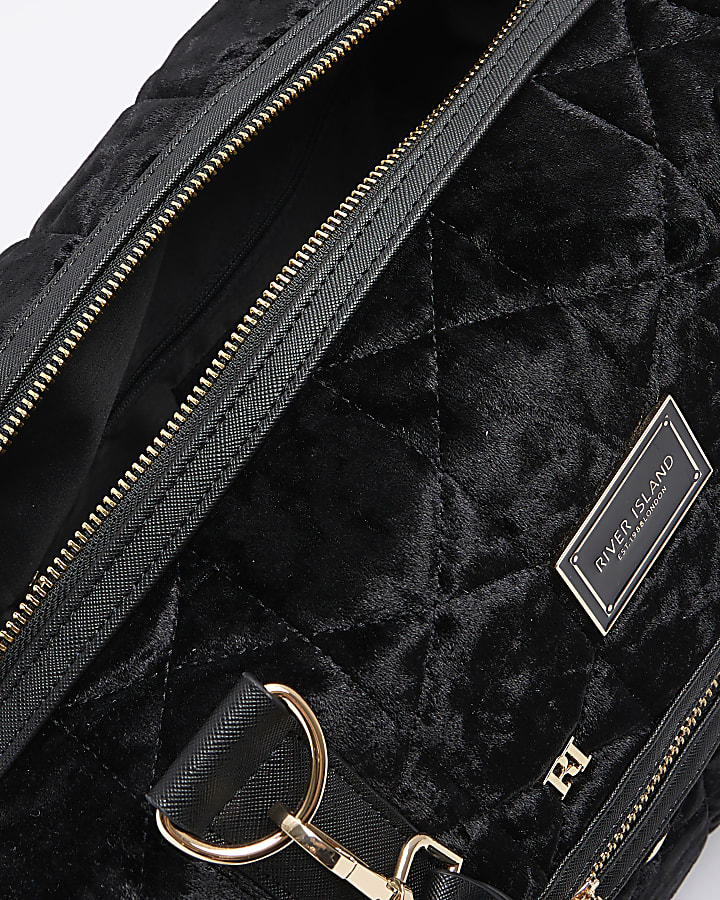 Black velvet quilted travel bag