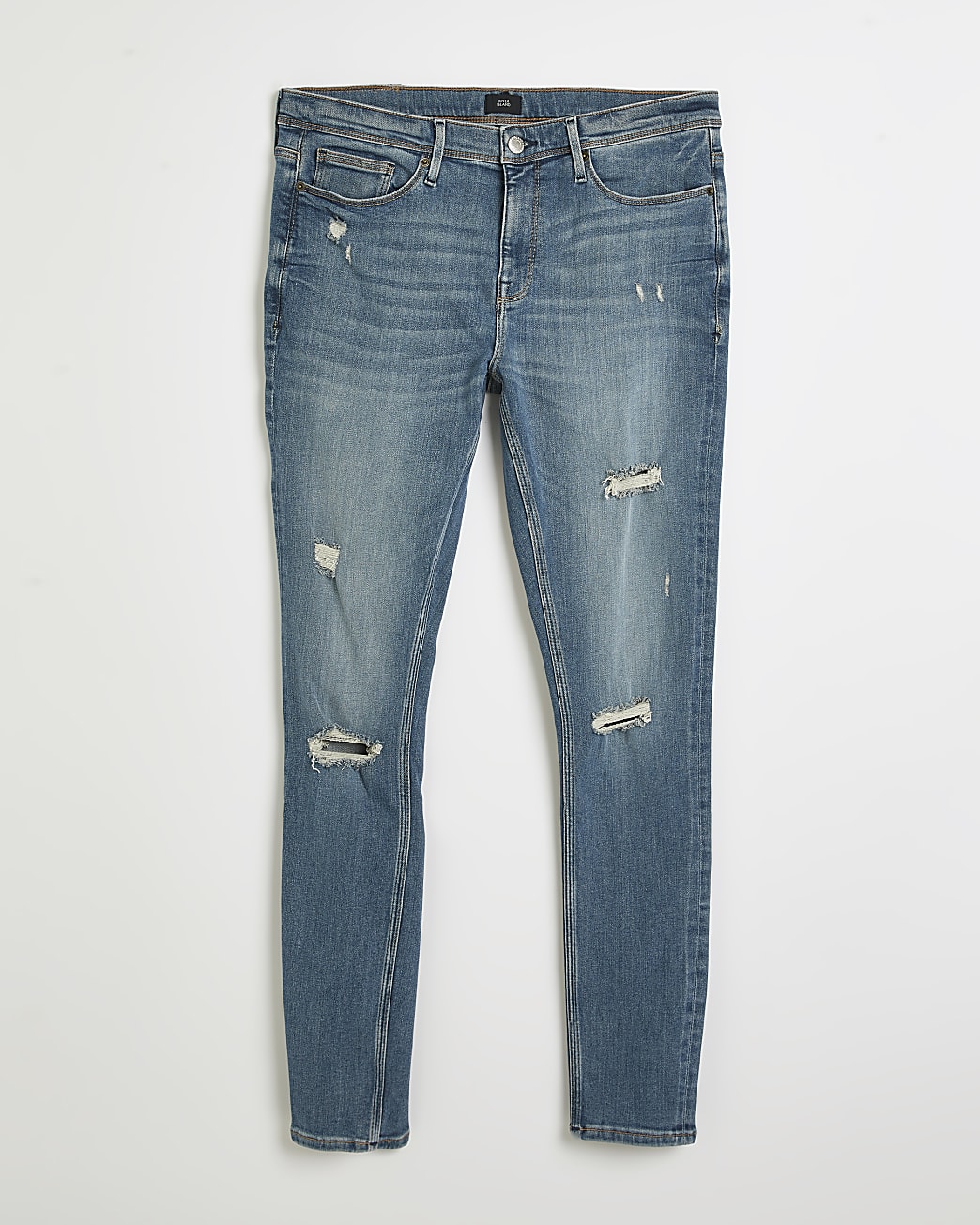 Blue spray on skinny fit ripped jeans