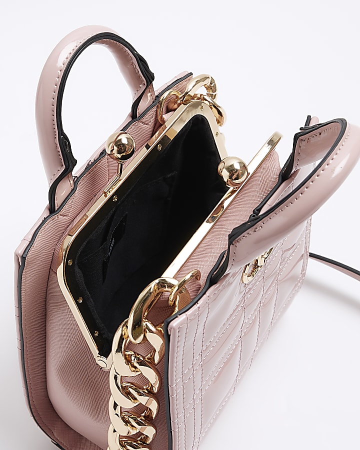 Pink quilted clip top cross body bag