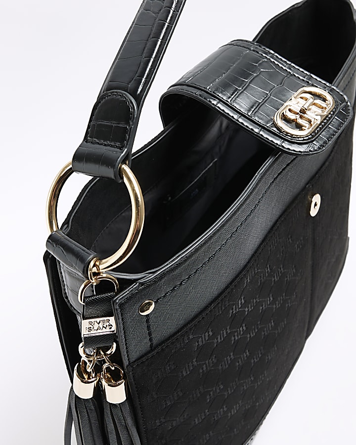 Black embossed shoulder bag