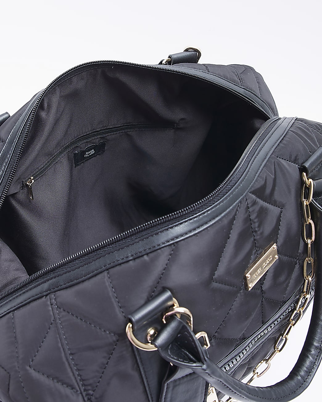 Black quilted holdall weekend bag