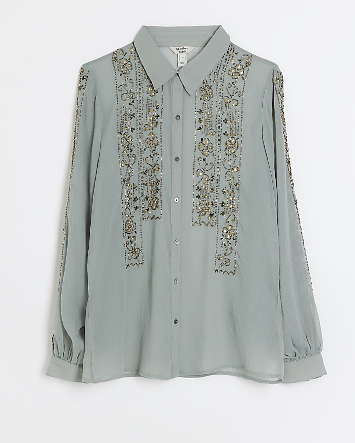 Blue embellished long sleeve blouse