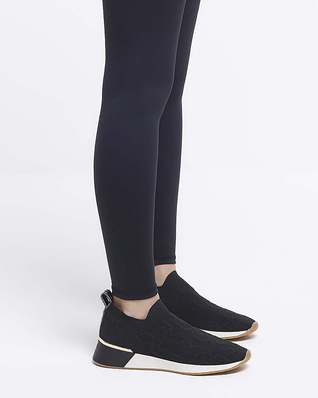 Black knitted embossed trainers