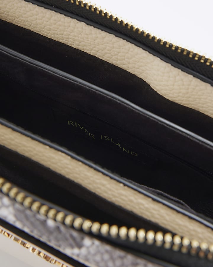 Cream snake print cross body bag