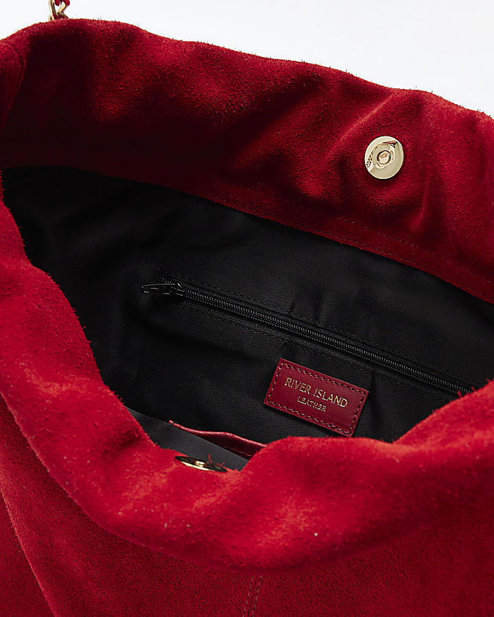 Red suede shoulder bag