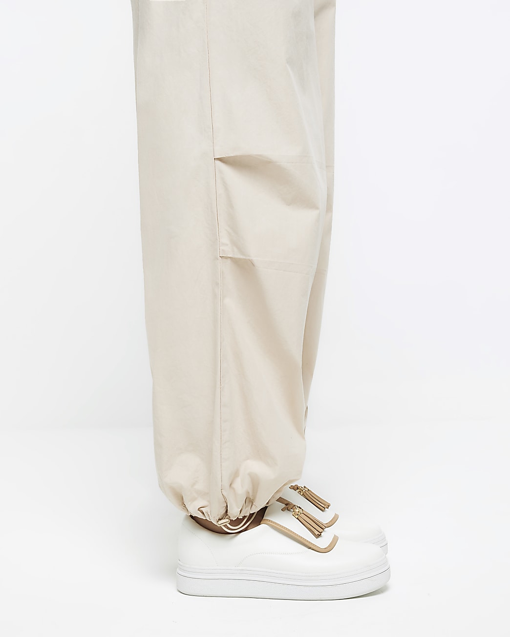 White tassel faux leather trainers