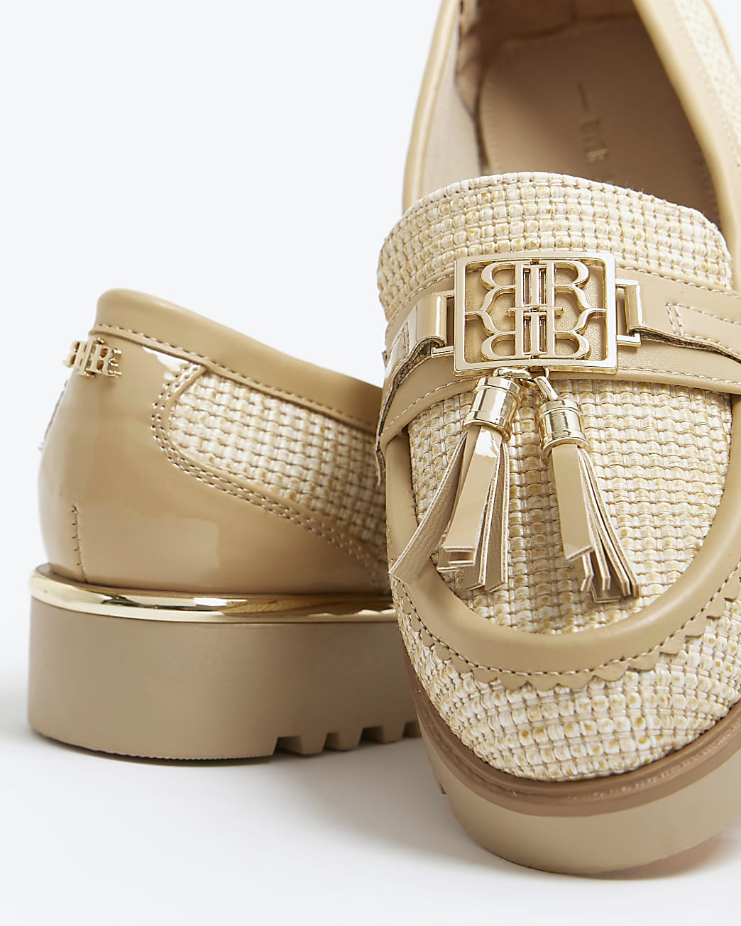 Beige raffia tassel detail loafers