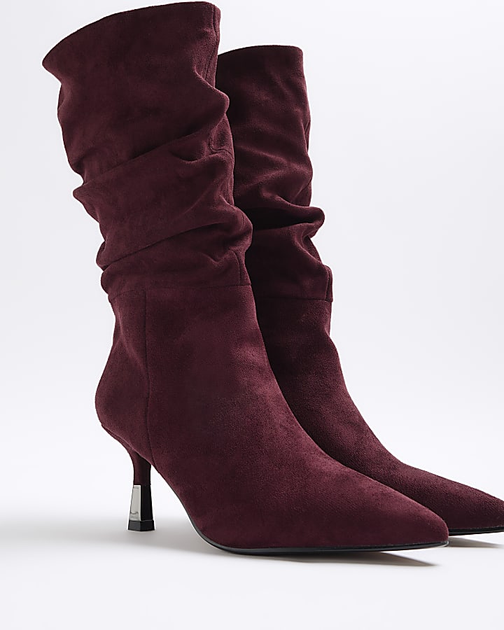 Red slouched high leg heeled boots
