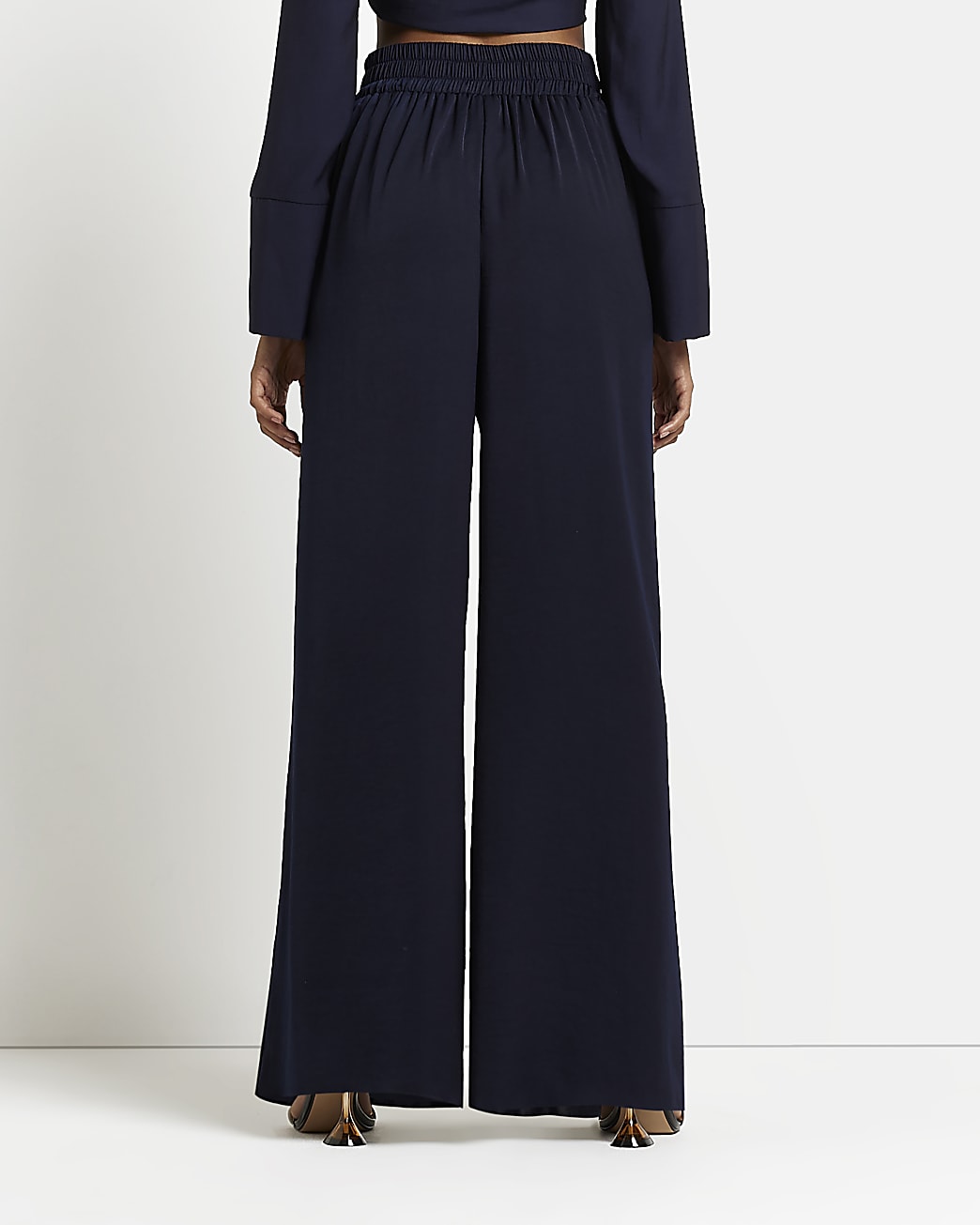 Navy wide leg pleated trousers