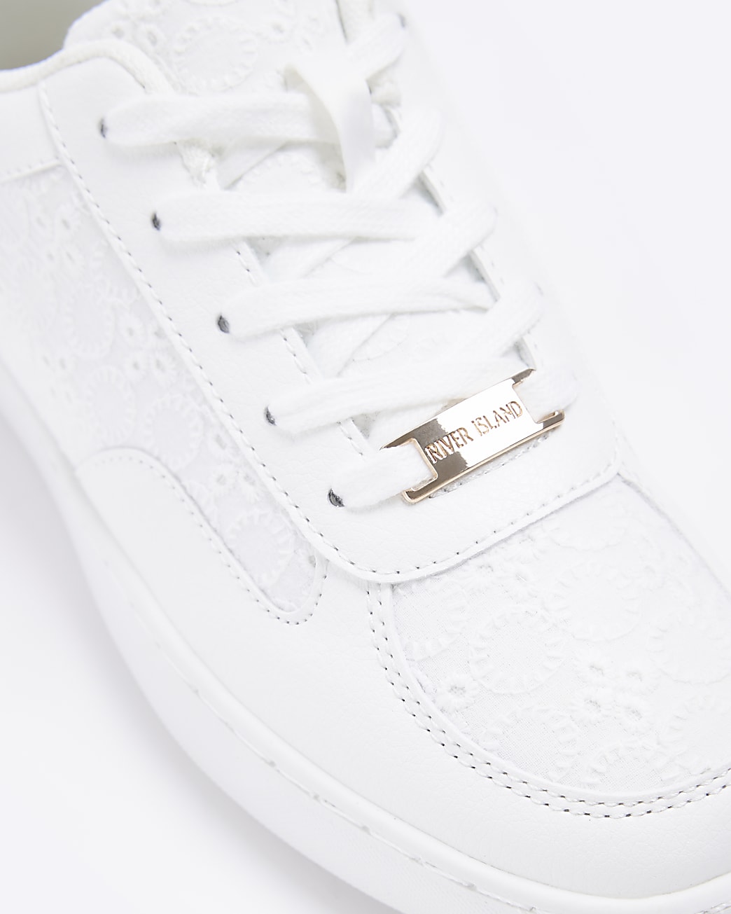 White broderie lace up trainers