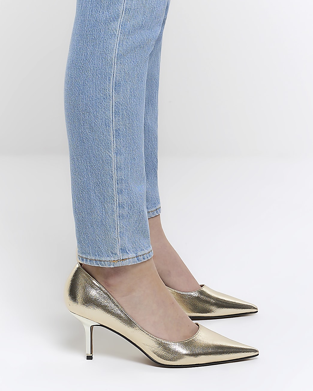 Gold heeled court shoes