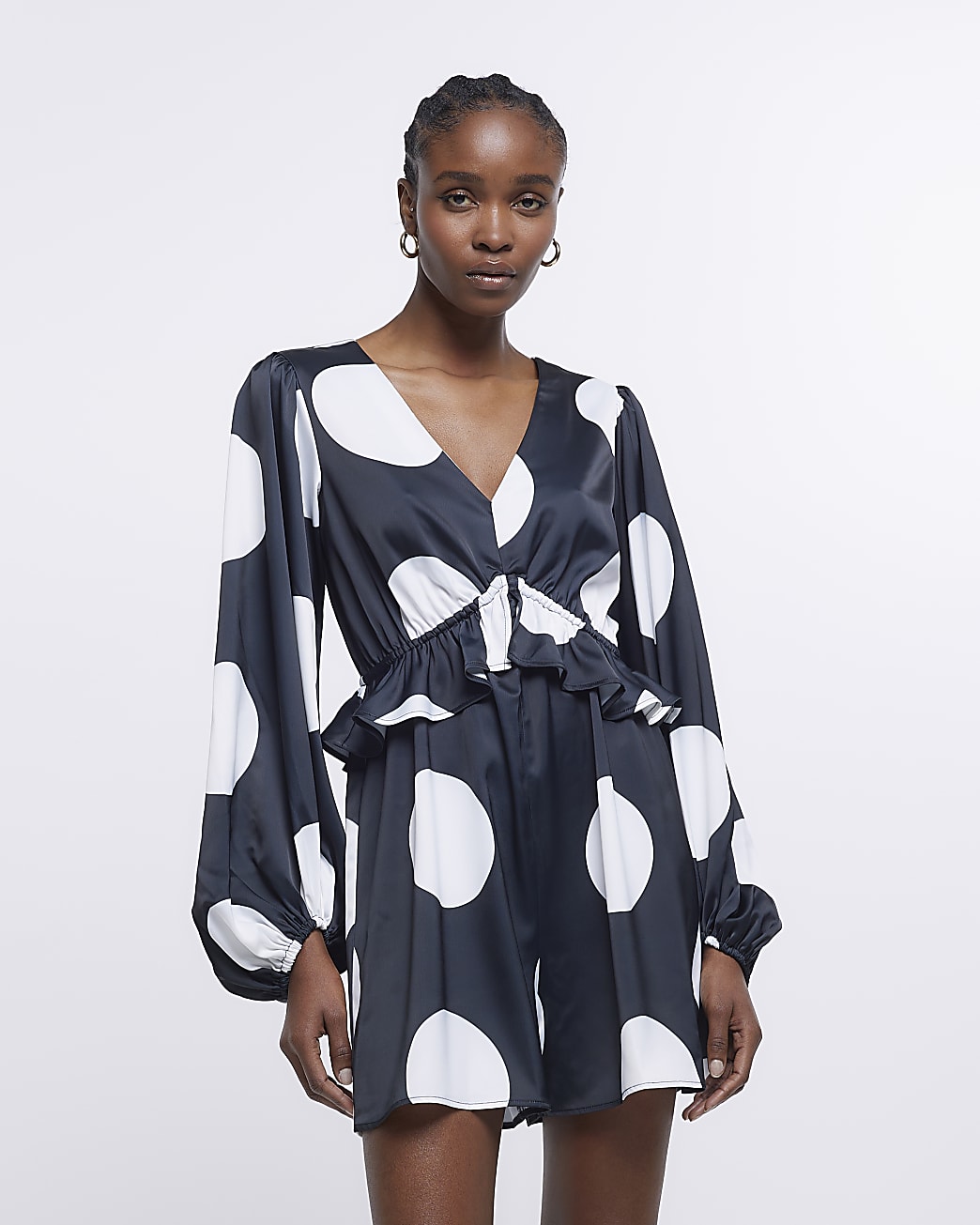 Black spot long sleeve playsuit