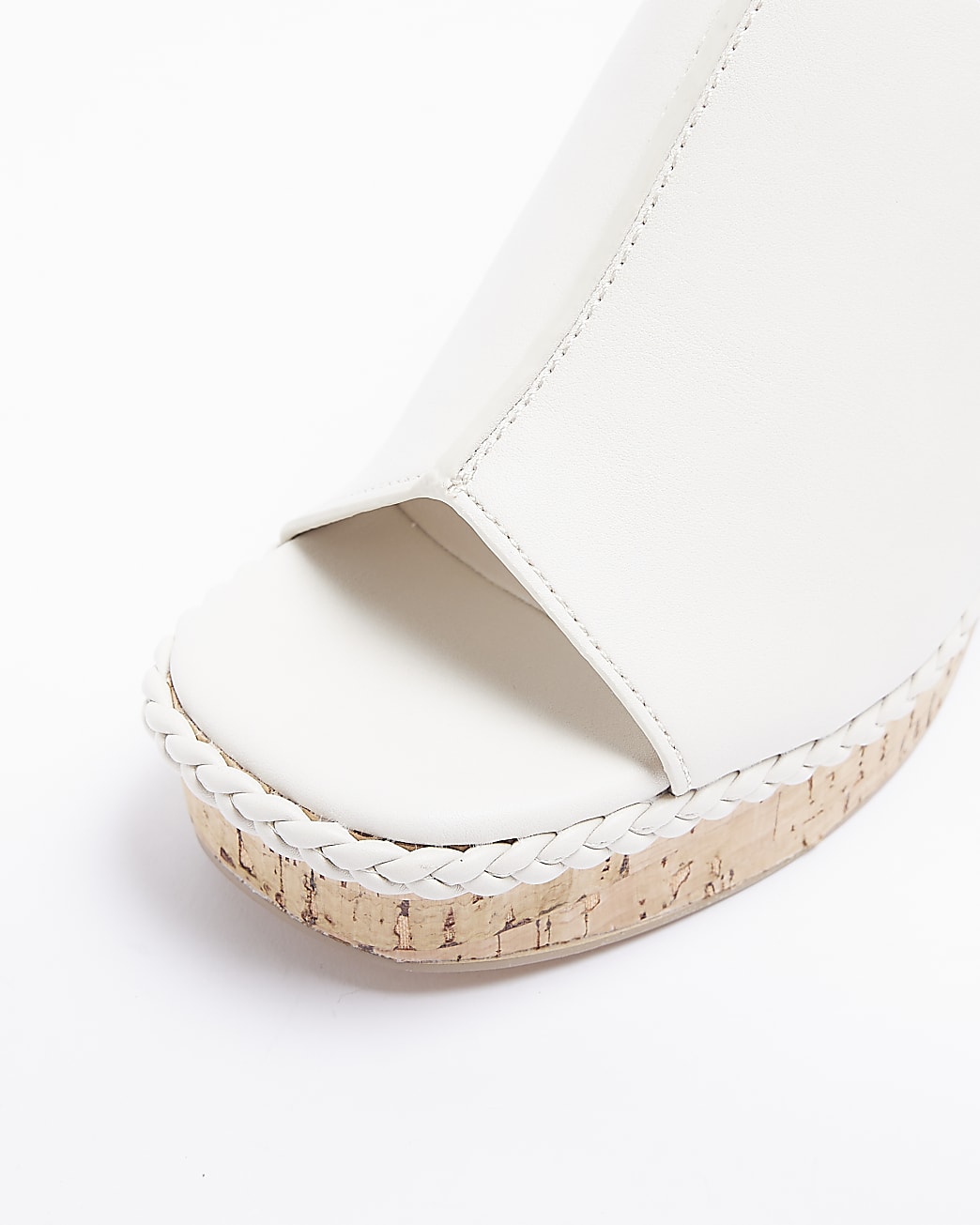 White platform heeled sandals