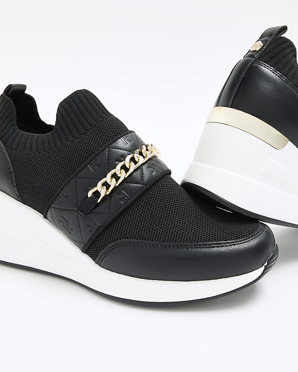 Black chain strap wedge trainers