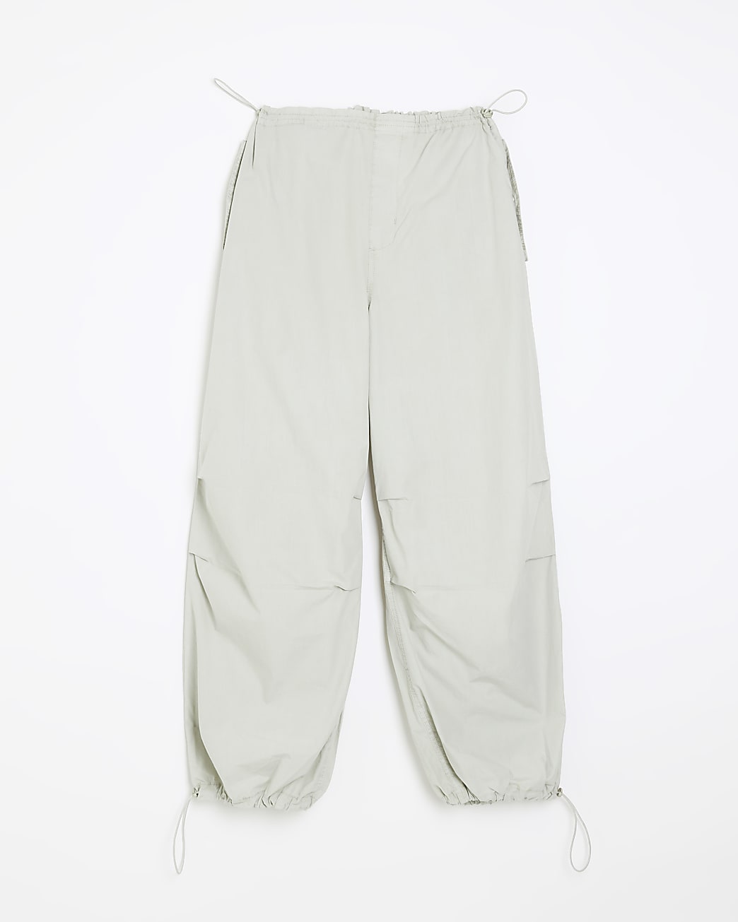 Green baggy low rise parachute trousers