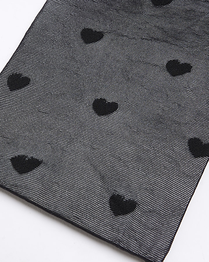 Black heart print tights