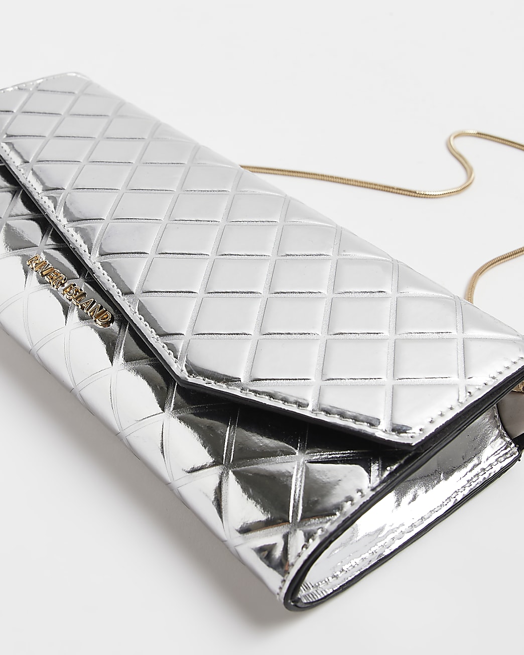 Silver quilted asymmetric clutch bag