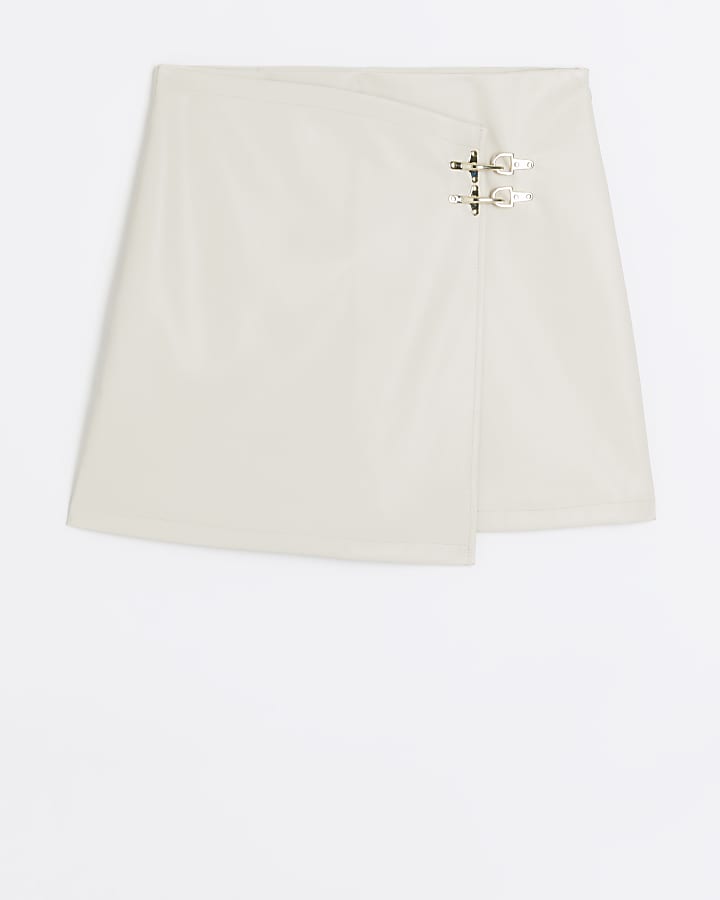 Cream faux leather buckle mini skirt