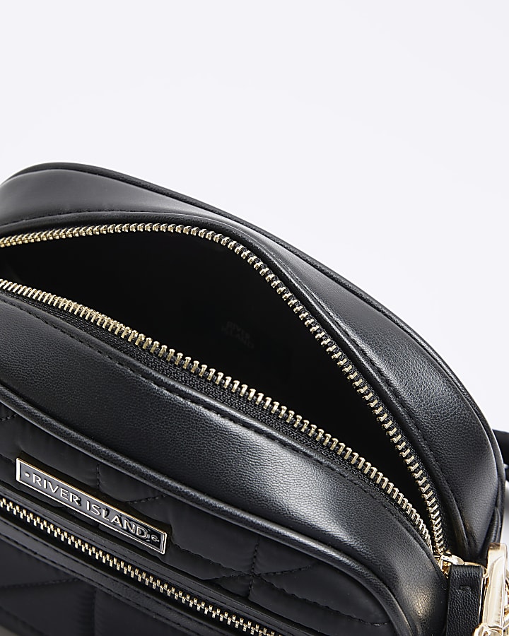 Black quilted zip pocket cross body bag