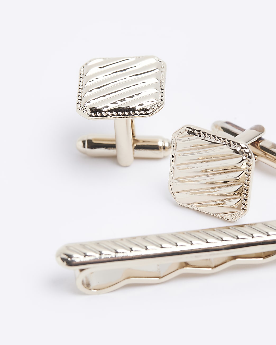 Gold colour textured tie clip set