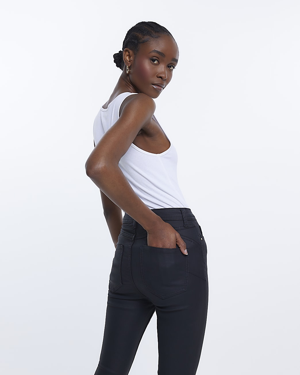 Black coated high waisted flared jeans