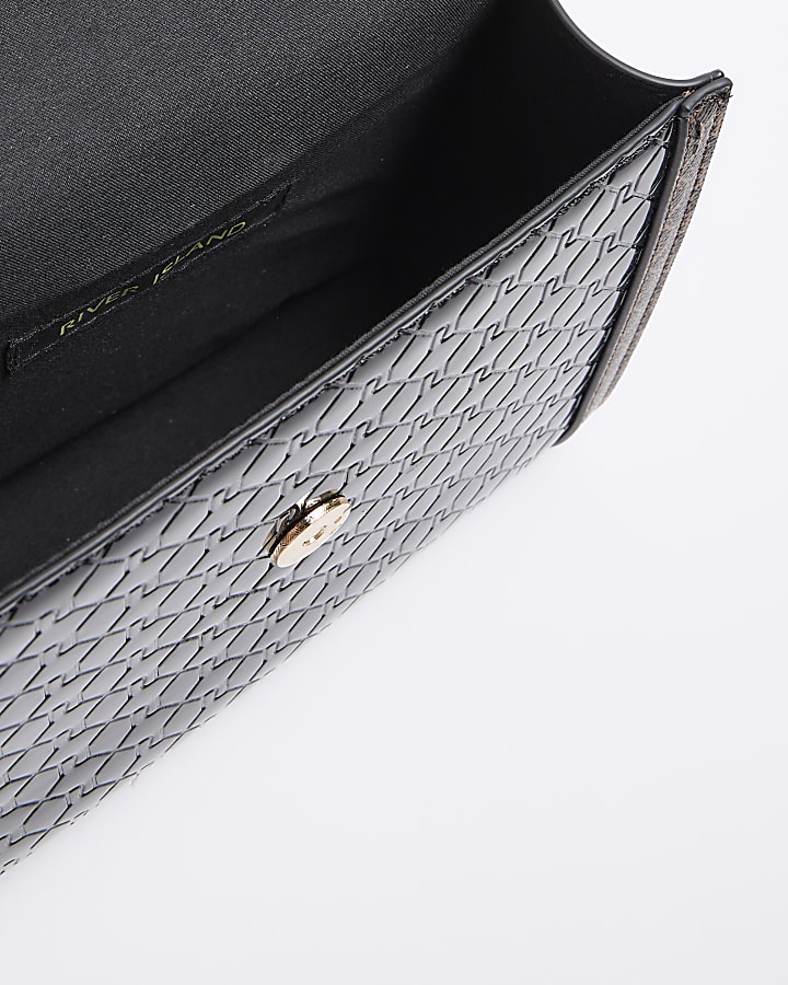 Black embossed RI monogram cross body bag