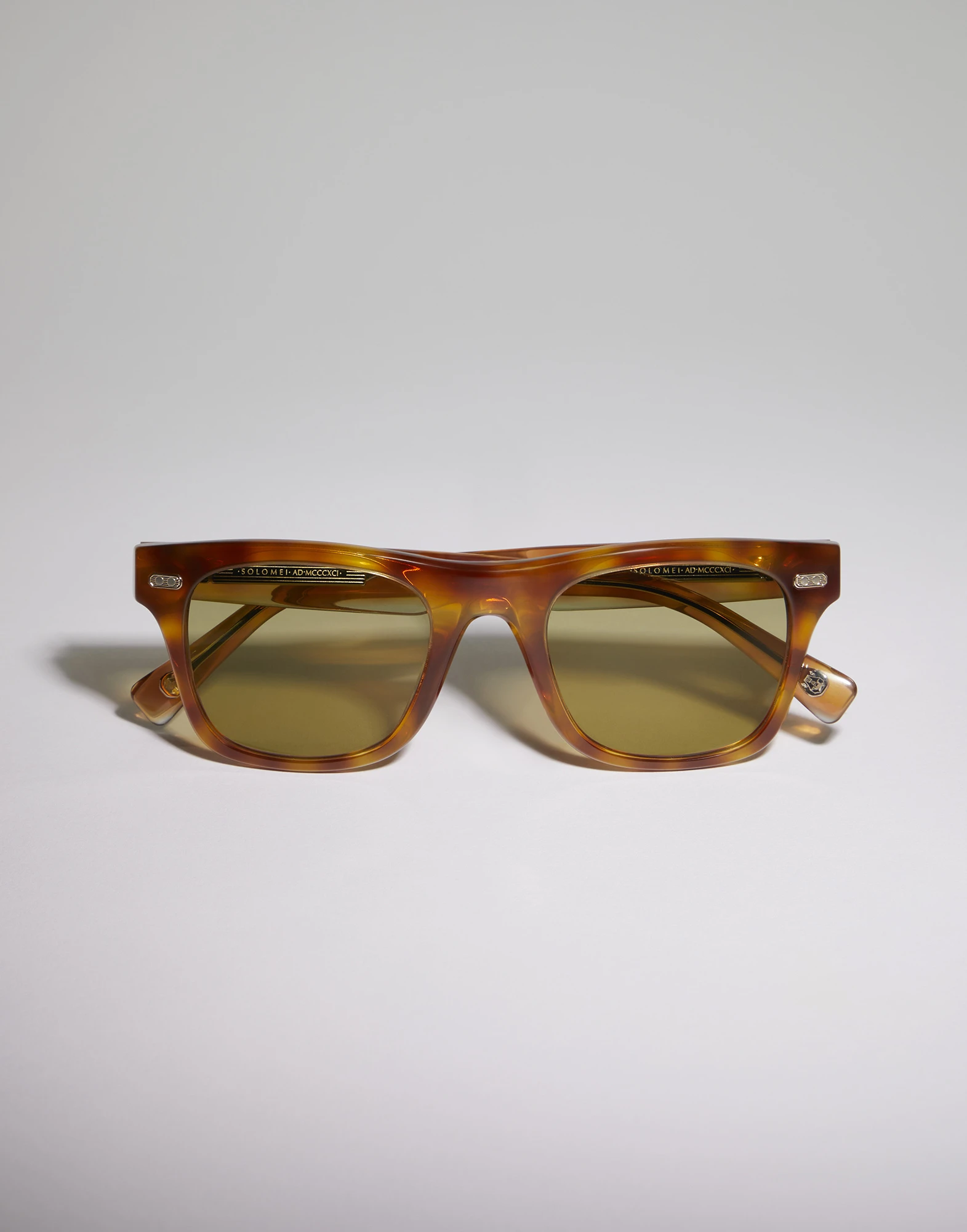 Mr. Brunello with photochromic lenses