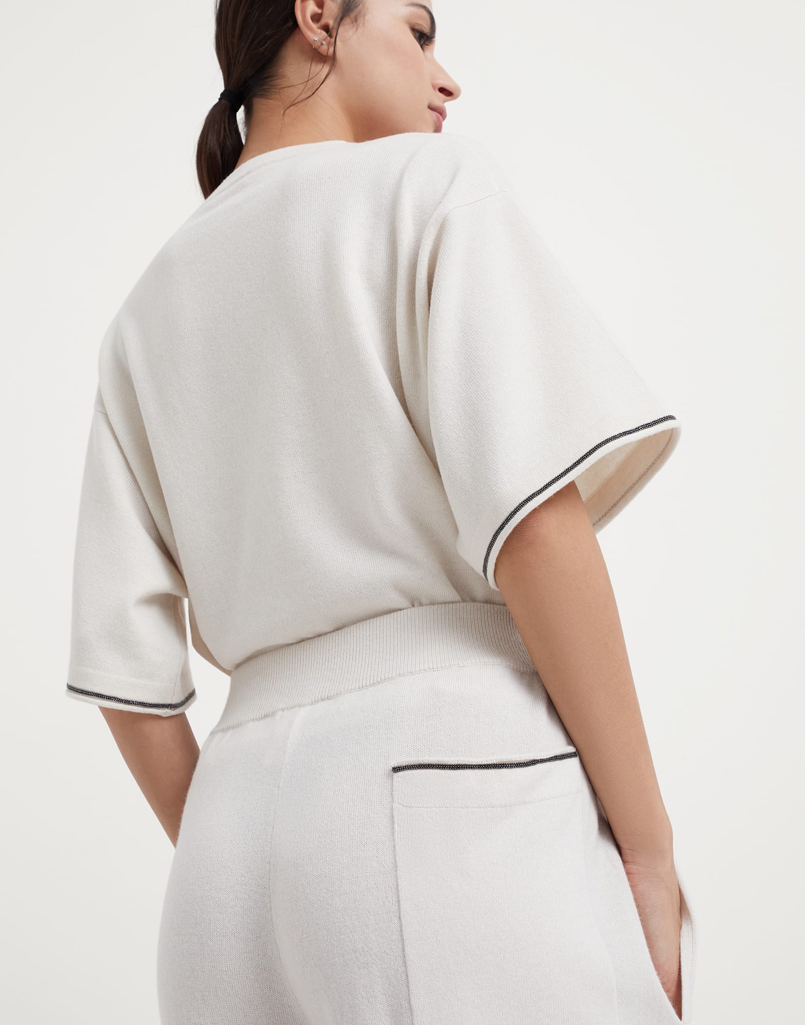 Virgin wool, cashmere and silk knit trousers with shiny pocket detail
