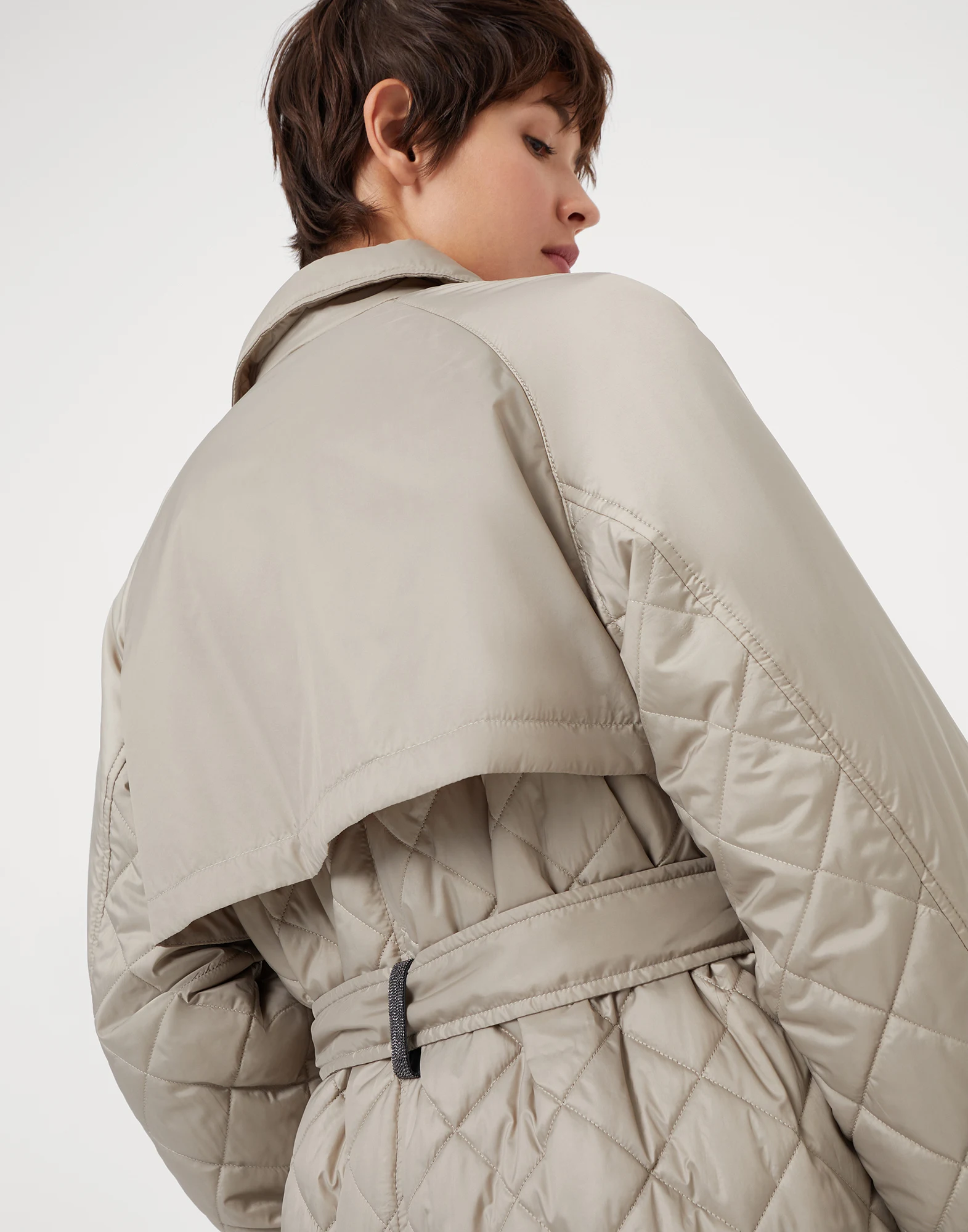 Water-resistant matte nylon quilted trench with Thermore? padding and precious belt loop