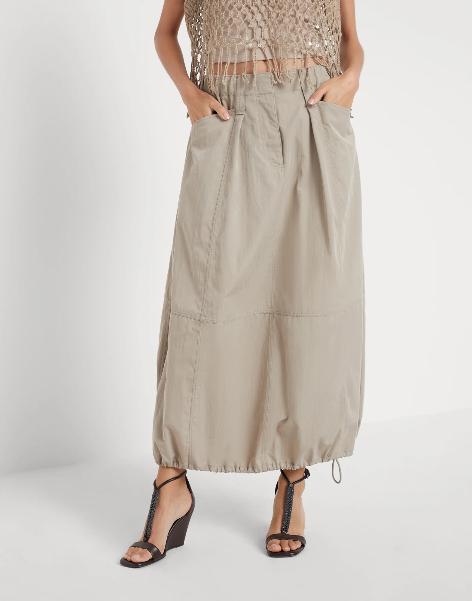 Wrinkled techno cotton gabardine curved utility skirt with monili